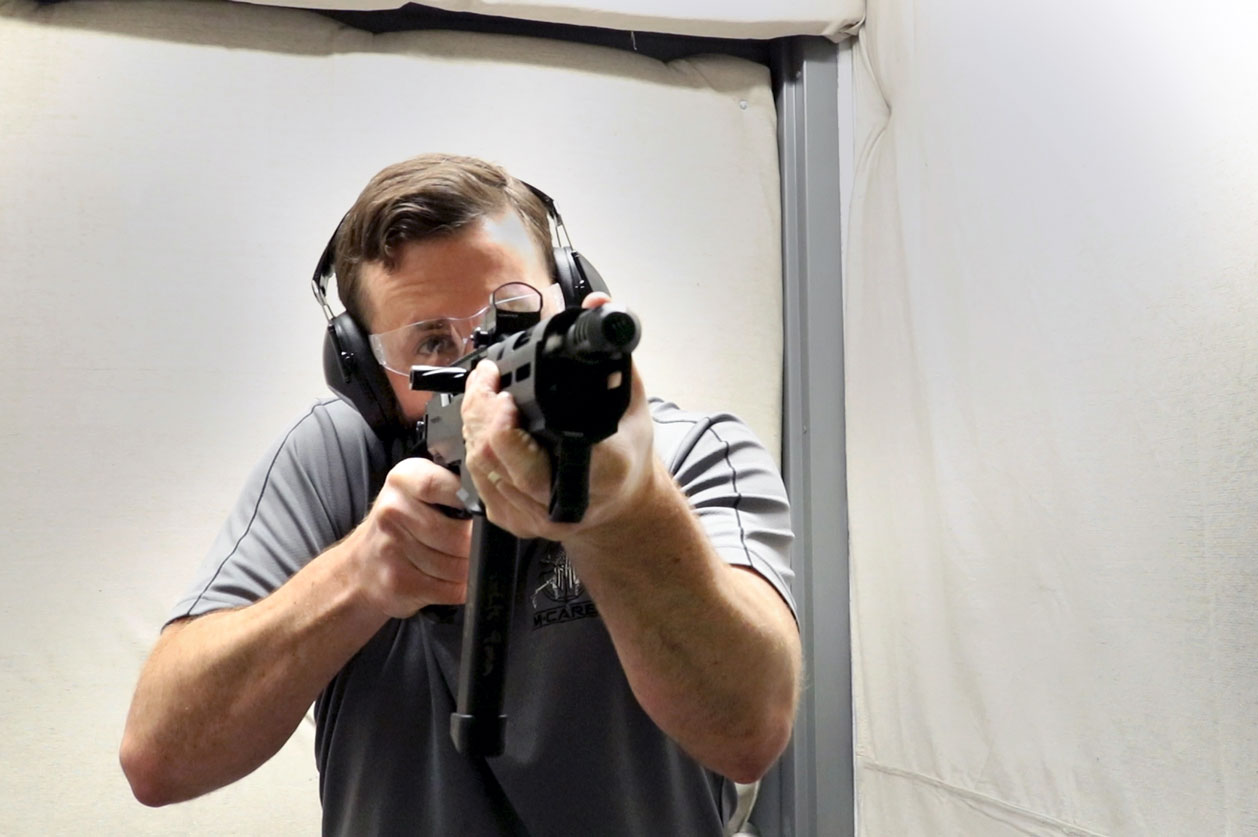 Gunsmith Test Firing Firearm at Range